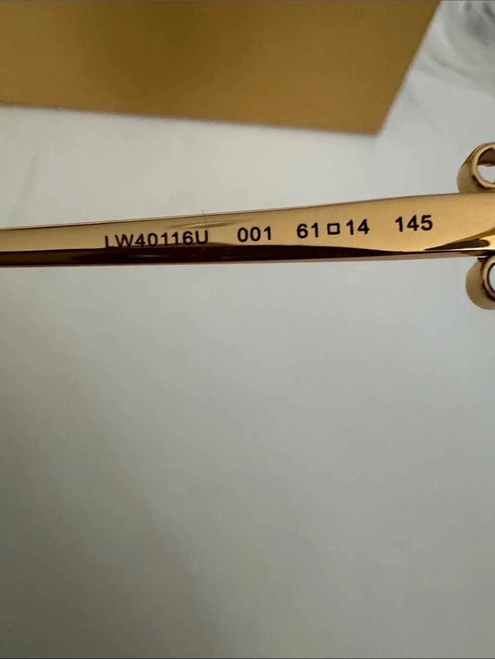 Loewe Gold Frame Sunglasses with Orange-Gold Mirrored Lenses